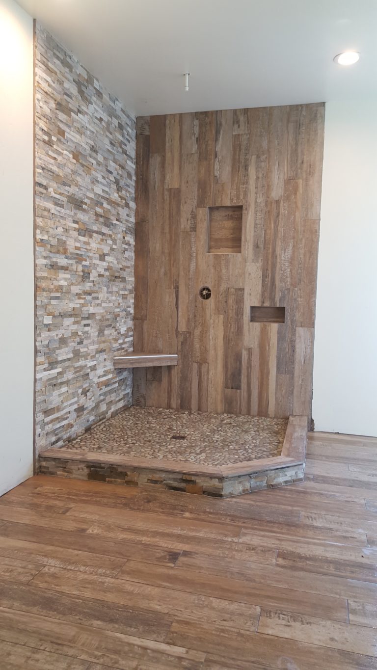 Shower Woodlook Tile, Quartzite Ledger, and Pebbles Tile and